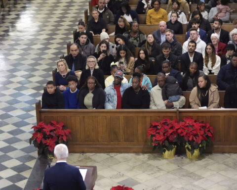 Biden tells New Orleans mourners they are not alone as he honors victims of attack