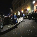 New Orleans holds 1st parade of Carnival season 5 days after deadly attack on Bourbon Street