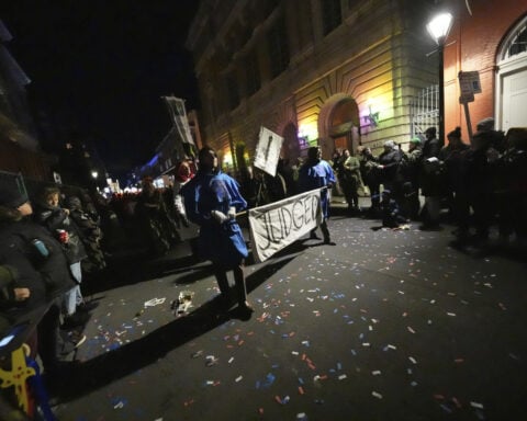 New Orleans holds 1st parade of Carnival season 5 days after deadly attack on Bourbon Street