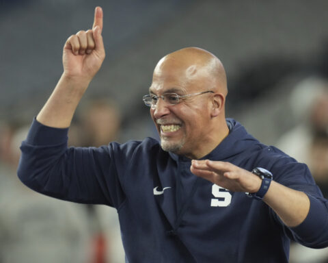 Black coaches have shot at college football title a generation after that milestone was hit in hoops