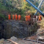 One body recovered from flooded Indian mine as rescuers search for trapped men