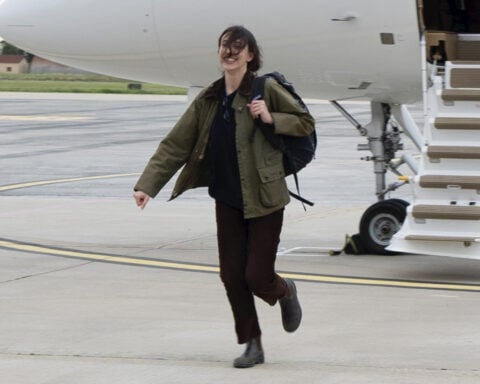 An Italian journalist is freed from detention in Iran and returns home