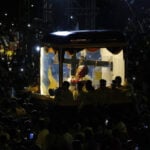 Filipino Catholics pray for good health and peace in huge procession venerating Jesus statue