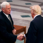 Trump shakes hands with Pence, engages Obama at Carter funeral