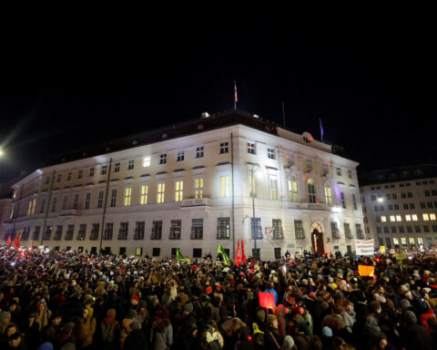 Austria's far-right led coalition talks set to begin, thousands protest
