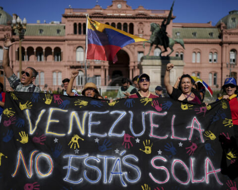 Venezuela's opposition leader defies Maduro to lead protests that end in confusing arrest claims