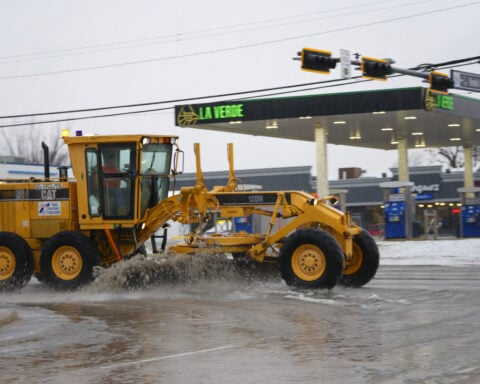 A powerful winter storm's heavy snow and sleet cancels flights and closes schools across US South