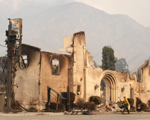 Wildfires latest: At least 10,000 structures have burned in a series of fires around Los Angeles