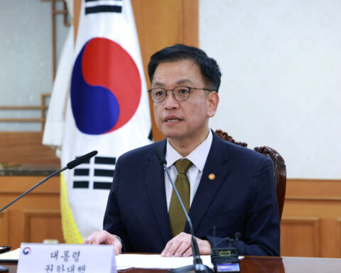 Two weeks in, South Korea's latest leader Choi walks political tightrope