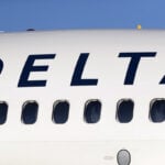 Busy holiday travel season fuels big fourth quarter for Delta