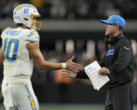 From stories to work shirts, how Jim Harbaugh's approach has turned around the Los Angeles Chargers