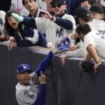 Yankees fans who interfered with Mookie Betts during World Series banned from all MLB games