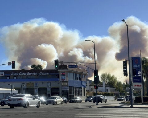 LA Rams head for Arizona and a crucial playoff game with their minds on their fire-ravaged hometown