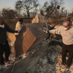 With their Los Angeles-area homes still smoldering, families return to search the ruins for memories