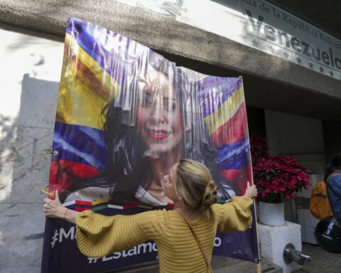 Venezuela's opposition supporters grapple with hope and disappointment after Maduro is sworn in