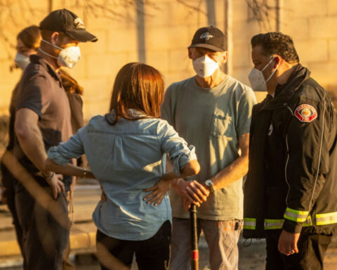 Prince Harry and Meghan make surprise appearance to comfort people affected by LA wildfires