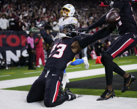 Texans intercept Herbert a career-high 4 times in a 32-12 win over Chargers in wild-card playoff