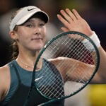 Zheng wins indoors as Day 1 of the Australian Open is disrupted by rain