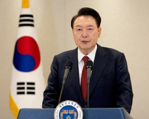 South Korea's Yoon will not attend first impeachment trial hearing, Yonhap says, citing lawyer