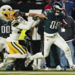 Hurts tosses 2 TD passes and Goedert throws 3 stiff-arms to lead Eagles past Packers 22-10