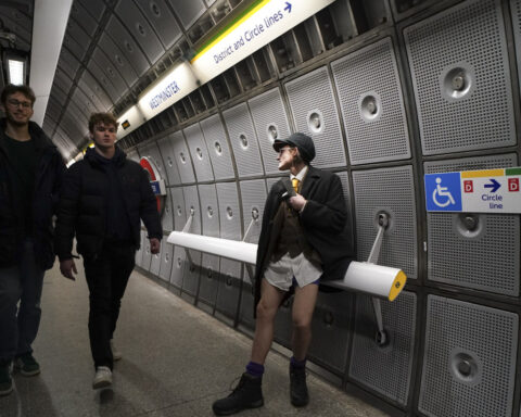 No pants? No problem. London subway riders bare their legs to brighten a gray winter day