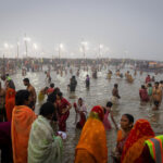 Dreadlocked Indian ascetics take holy dip in Hindu Kumbh festival