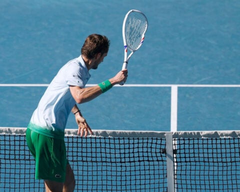 Tennis star Daniil Medvedev destroys a camera in outburst during tough Australian Open victory