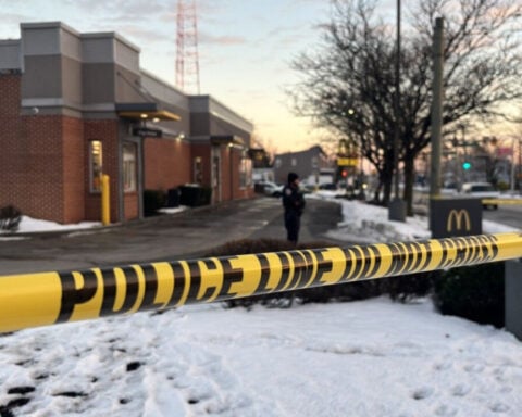 Slain security guard & son were co-workers on same shift at McDonald's