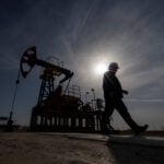 Oil little changed as falling US stockpiles outweigh soft demand outlook