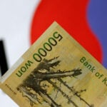 Foreigners sold South Korean equities last month by most since early 2020