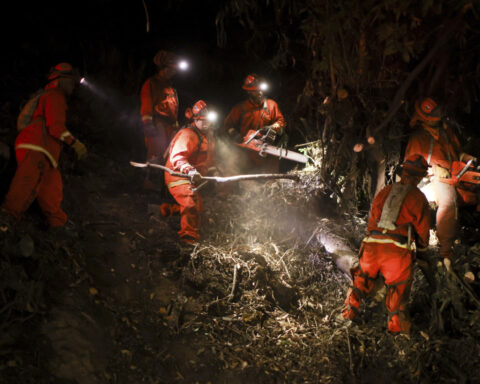 Dire fire warning for LA area pushed back as winds ease