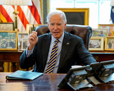 Biden bids farewell from Oval Office as Trump looms over his legacy