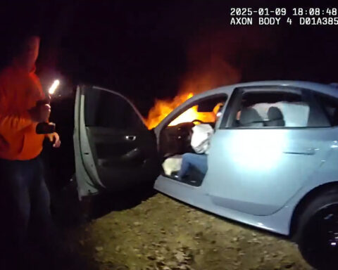 Rescue caught on camera following collision, vehicle fire