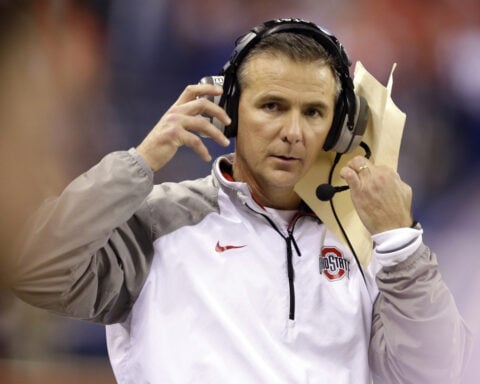 Urban Meyer joins Nick Saban in College Football HOF's Class of 2025; Vick, Strahan also elected