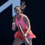 Iga Swiatek moves in a 3rd-round match against Raducanu at the Australian Open