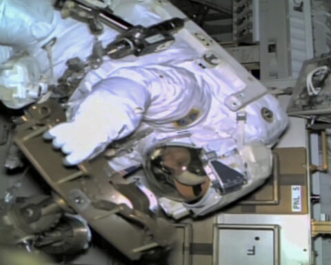 NASA's stuck astronaut steps out on a spacewalk after 7 months in orbit