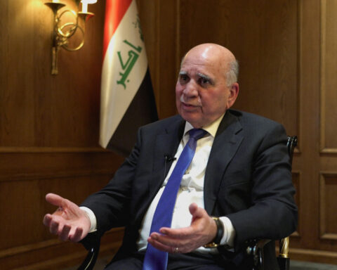 Iraq wants Iran-backed factions to lay down weapons, foreign minister says