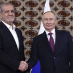 Iranian president arrives in Russia to sign partnership treaty