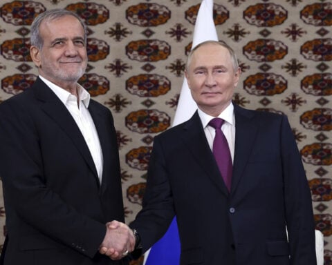 Iranian president arrives in Russia to sign partnership treaty