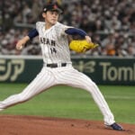 Prized Japanese pitcher Roki Sasaki says he intends to sign with Los Angeles Dodgers