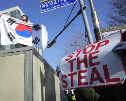 Impeached South Korean president arrives at court to argue against his arrest