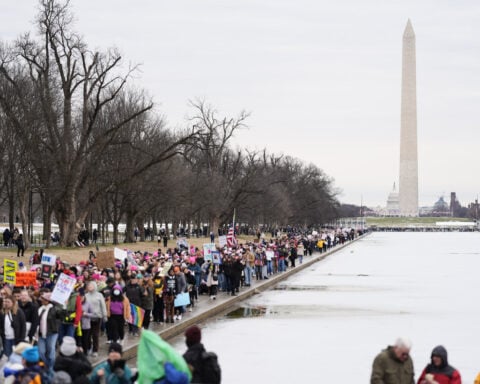 Thousands march in Washington days before Trump takes office