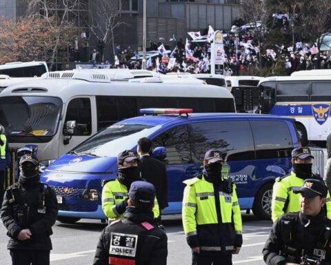 South Korea's impeached president is arrested over martial law declaration and his supporters riot