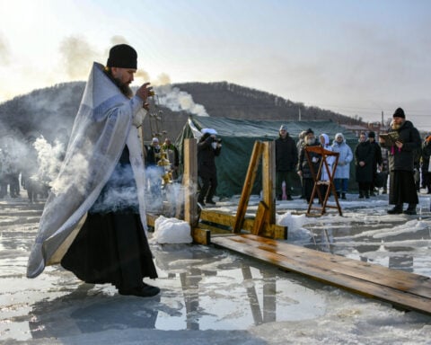 Warm weather threatens Epiphany ice water plunges for Russia's Orthodox Christians