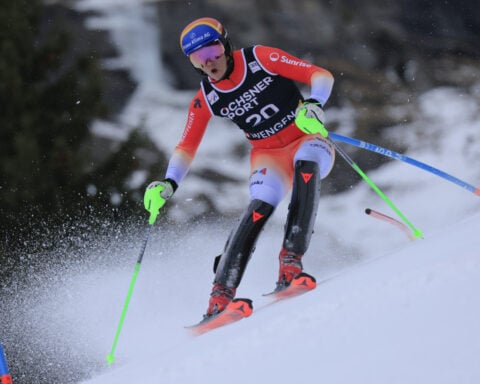 McGrath celebrates first-run lead in World Cup slalom with signature Cuche ski flip