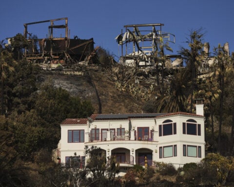 Why are lone homes left standing after the fires? It's not entirely luck