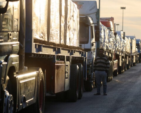 Biden welcomes Gaza ceasefire as aid trucks rush to help civilians