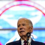 Biden tries to lift Democrats' spirits on last full day in office