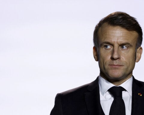 Wake up and spend more on defense, Macron tells Europe as Trump takes office