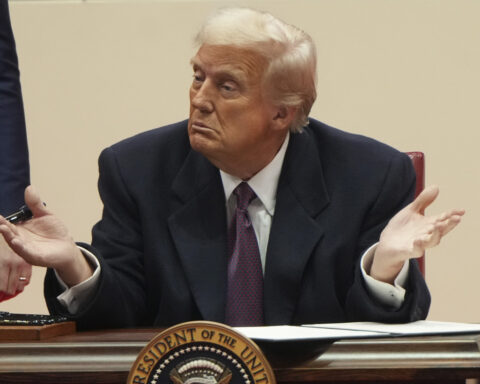 Trump signs executive order directing US withdrawal from the Paris climate agreement — again